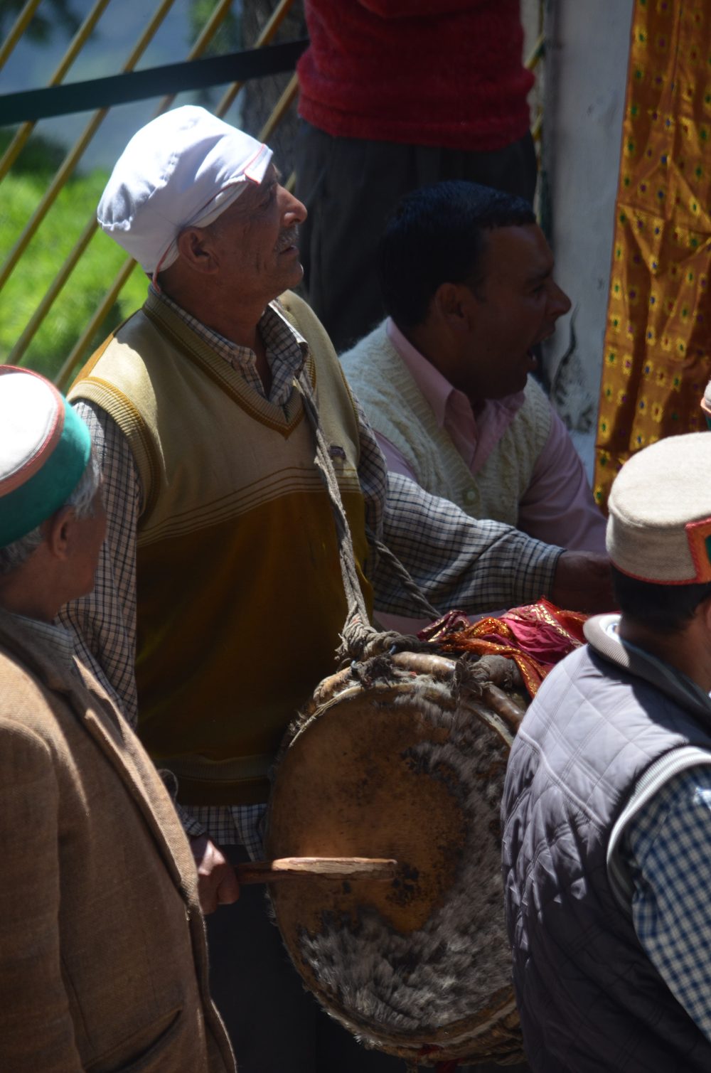 Musicians playing traditional drums at a Pangi festival