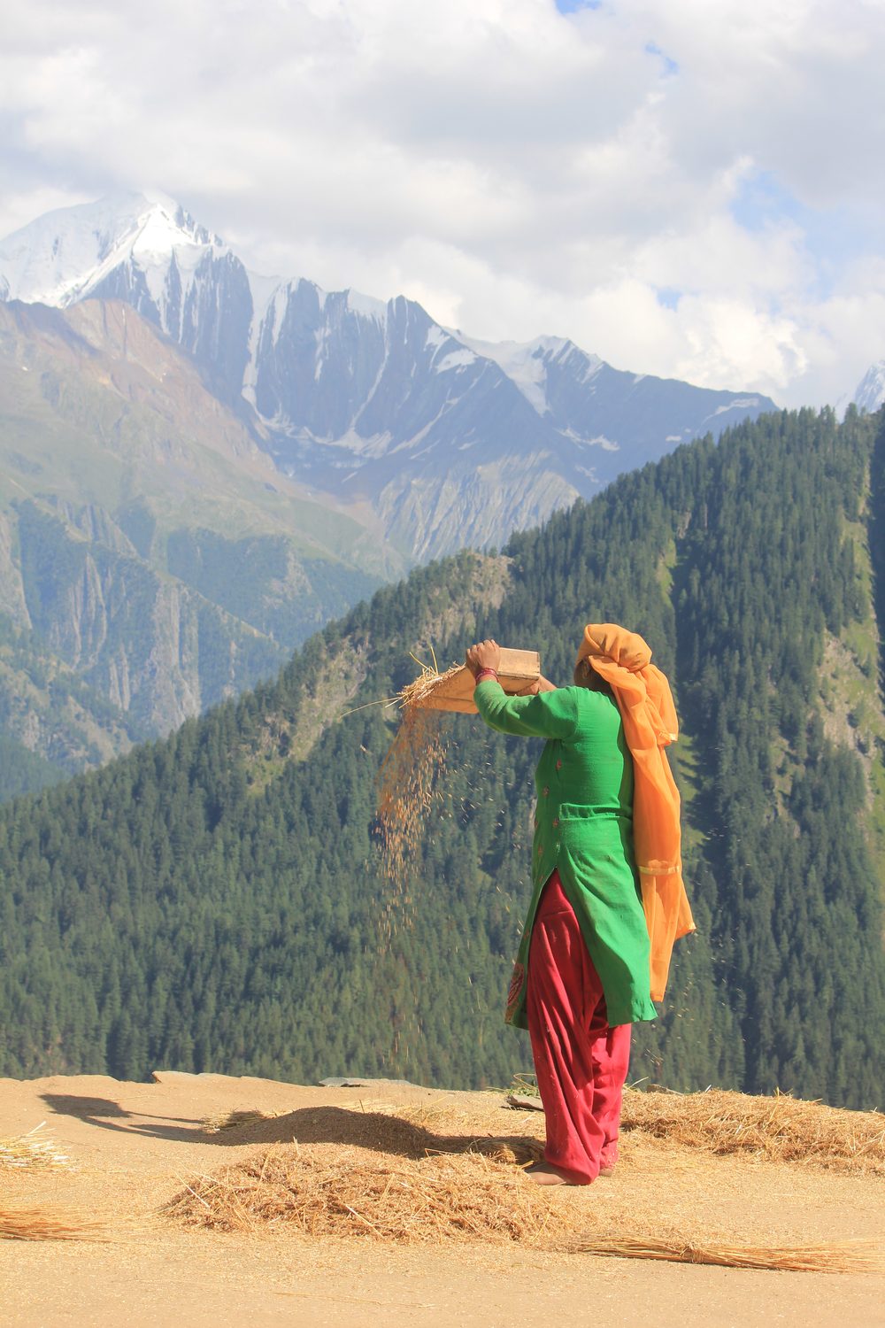 Women celebrating on a mountain ridge in Pangi